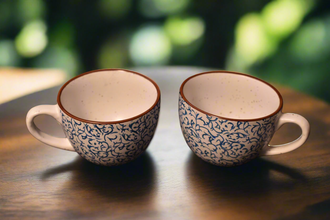 Elegant Blue Vine Pattern Tea Cup