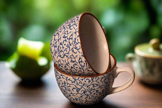 Elegant Blue Vine Pattern Tea Cup