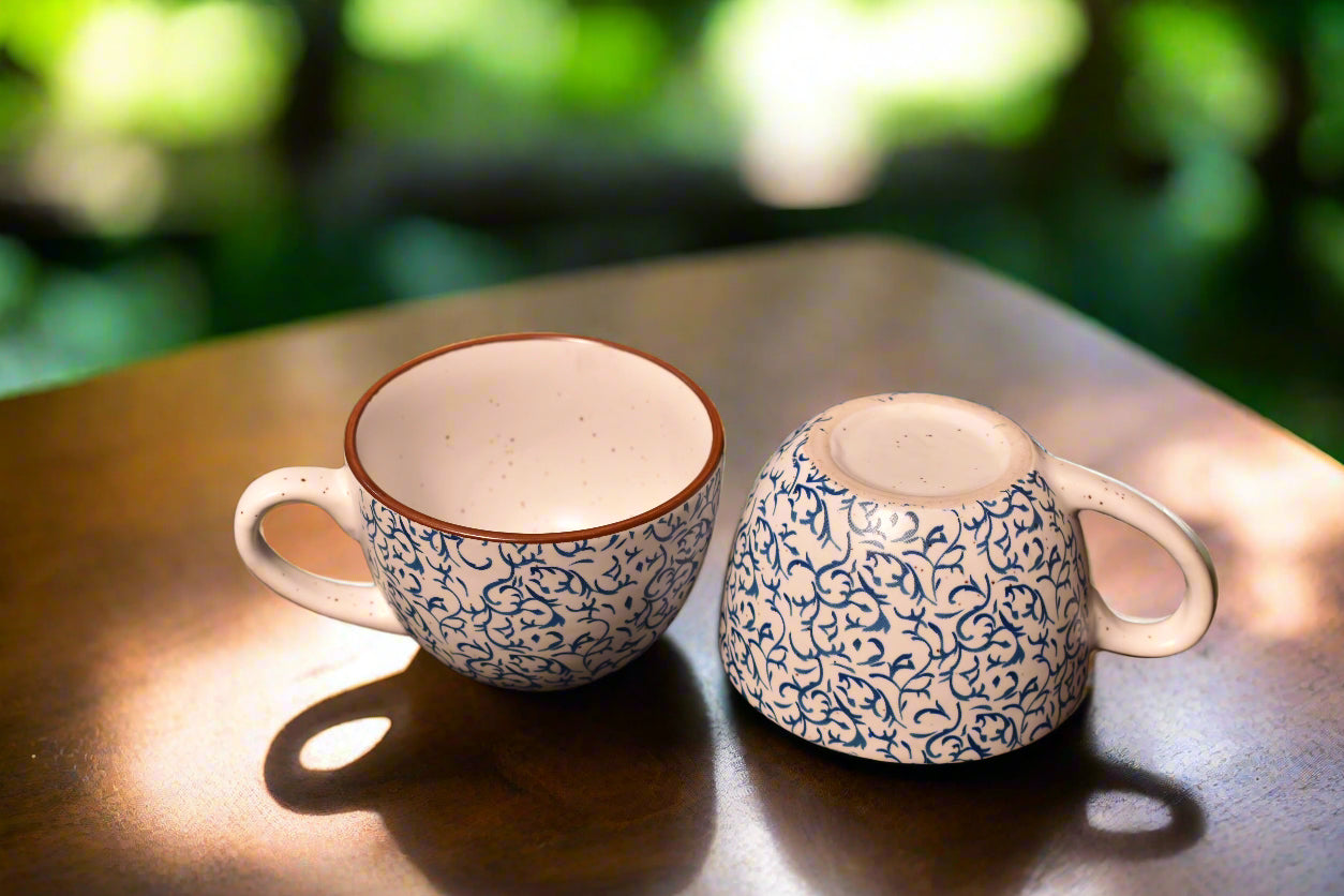 Elegant Blue Vine Pattern Tea Cup