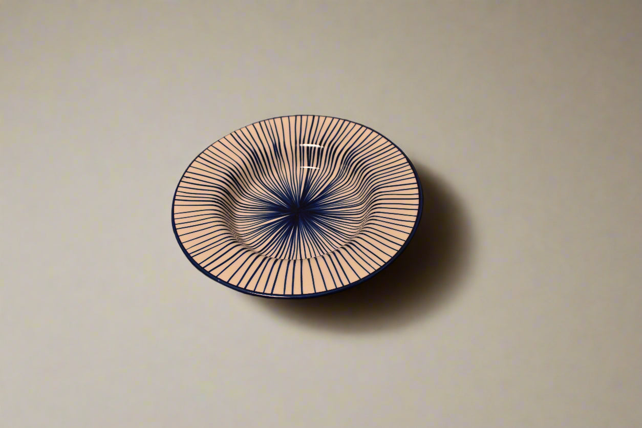 Deep Plate with Radiating Blue Line Pattern