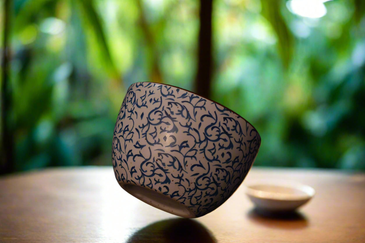 Elegant Blue Vine Pattern Tea Cup